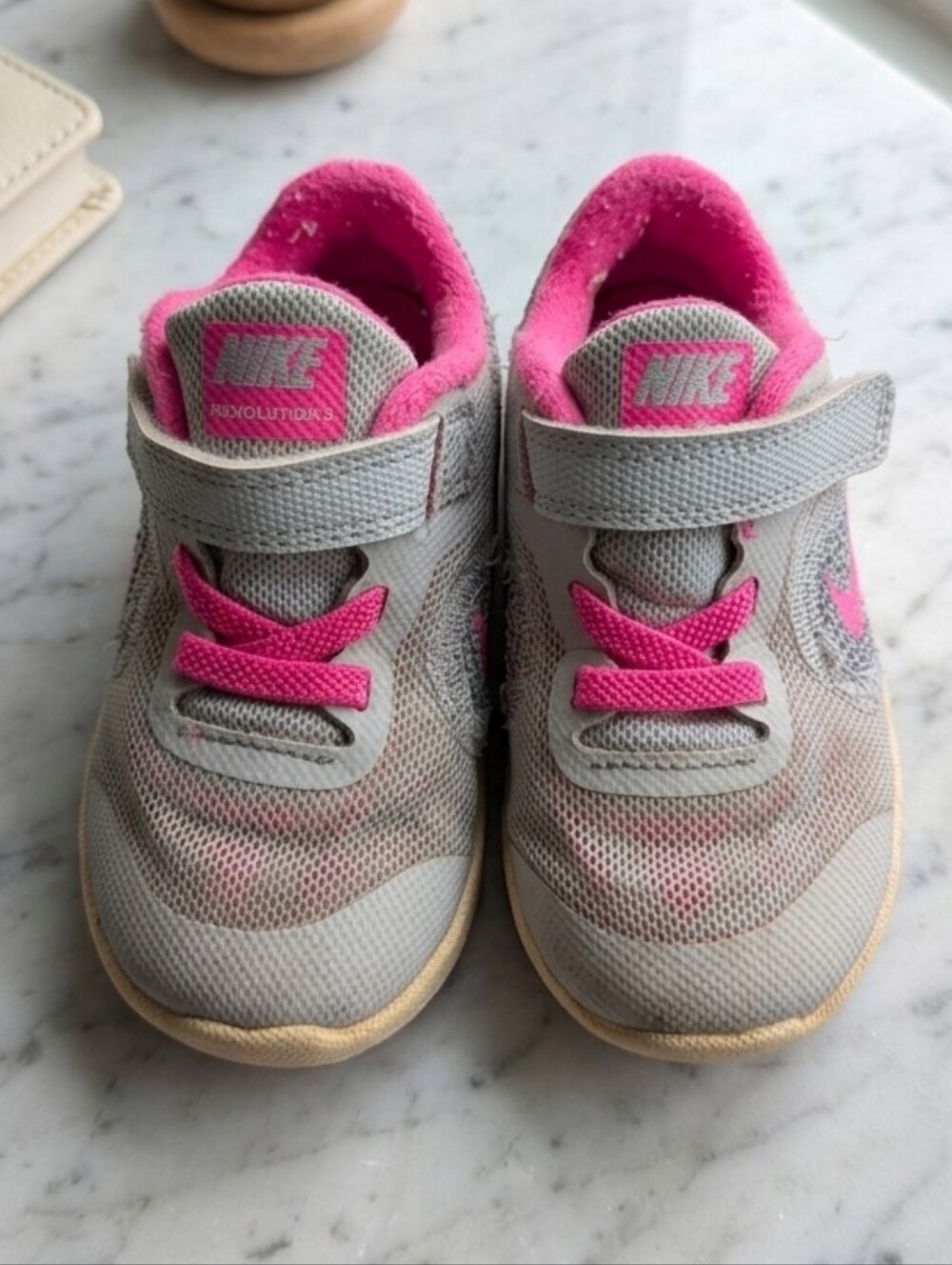 Nike 7C Kids Grey Sneakers with Pink Accents
